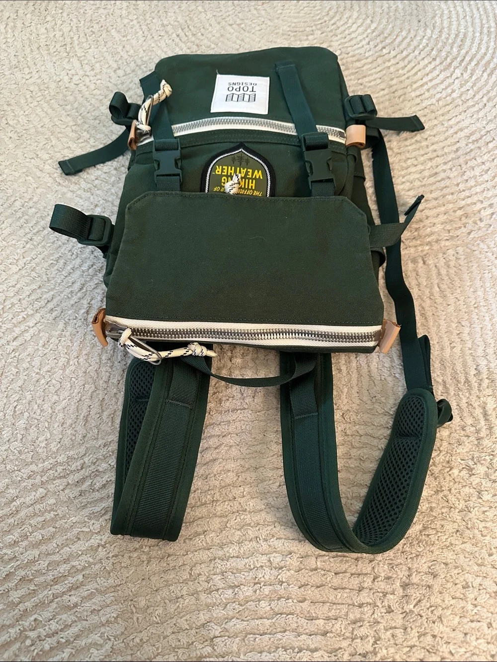 Topo Designs Mini River Green Canvas Backpack with White Zip Pocket